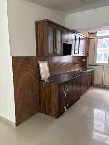 Kitchen in 3 BHK Apartment at Antriksh Golf View, Sector 78 – for Rent