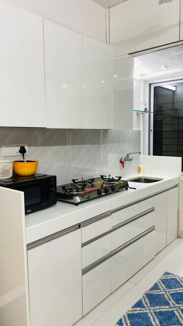 Kitchen in Studio Apartment at Juhu Vishal CHS, Juhu – for Rent