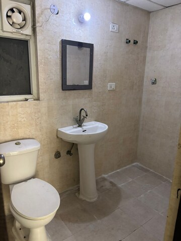 Bathroom in 3 BHK Apartment at Antriksh Golf View, Sector 78 – for Rent