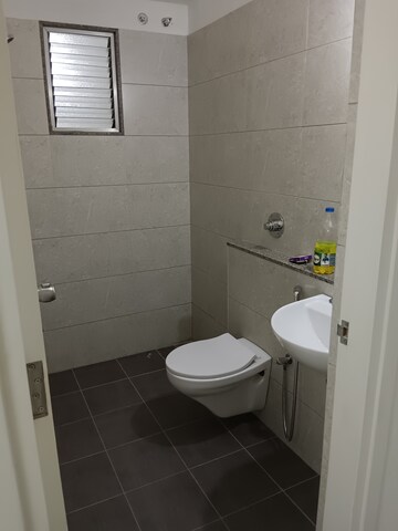 Bathroom in 3 BHK Apartment at Goyal Orchid Valley, Shela – for Rent