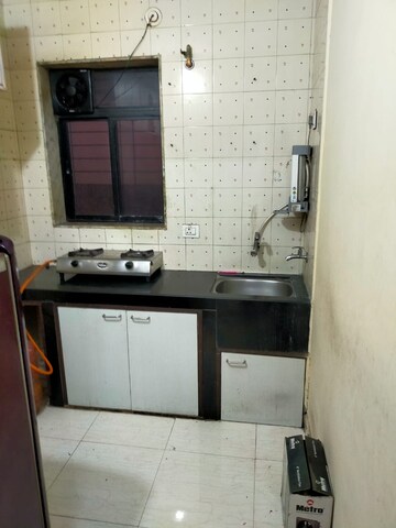 Kitchen in 1 BHK Apartment at Amrutdhara CHS, Kharghar – for Rent
