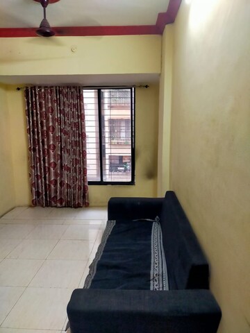 Living Room in 1 BHK Apartment at Amrutdhara CHS, Kharghar – for Rent