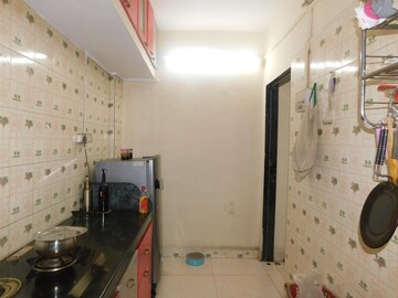 Kitchen in 3.5 BHK Penthouse at Kopar Khairane – for Sale