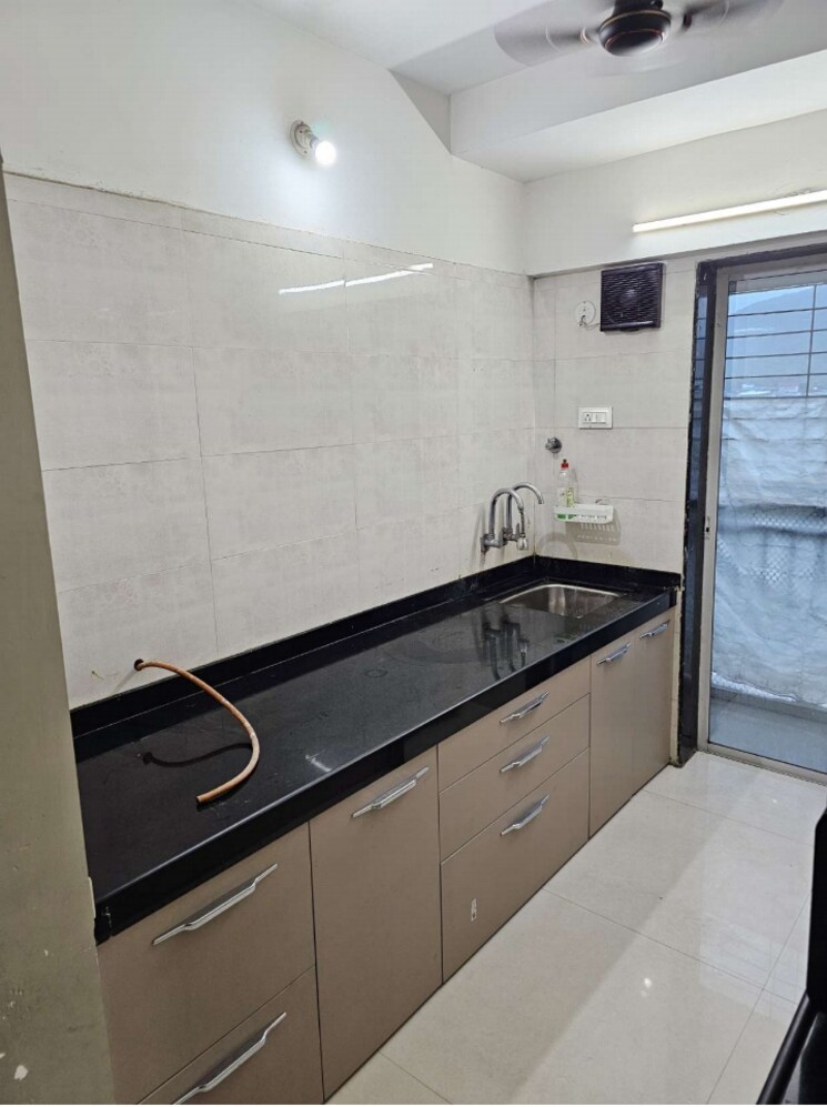 Kitchen, uma-elements 1 Bedroom 472 Sq.Ft. Apartment In Daighar Gaon Thane 8930037