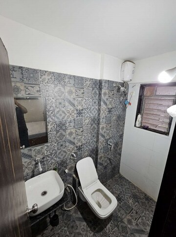 Bathroom in 1 BHK Apartment at Uma Elements, Daighar Gaon – for Rent