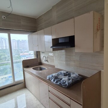 Kitchen in 2 BHK Apartment at Haware Intelligentia Sigma South, Tagore Nagar – for Rent