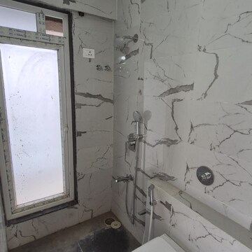 Bathroom in 2 BHK Apartment at Haware Intelligentia Sigma South, Tagore Nagar – for Rent