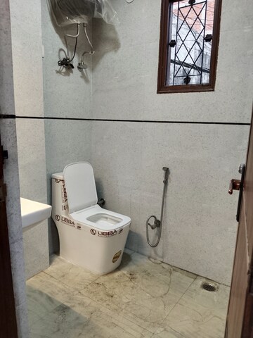 Bathroom in 2 BHK Apartment at Panchsheel Vihar – for Rent