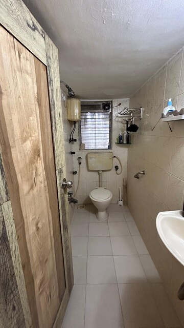 Bathroom in 1.5 BHK Apartment at Niwara CHS Andheri West, Andheri West – for Rent