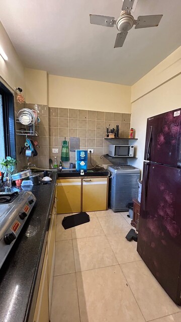 Kitchen in 1.5 BHK Apartment at Niwara CHS Andheri West, Andheri West – for Rent