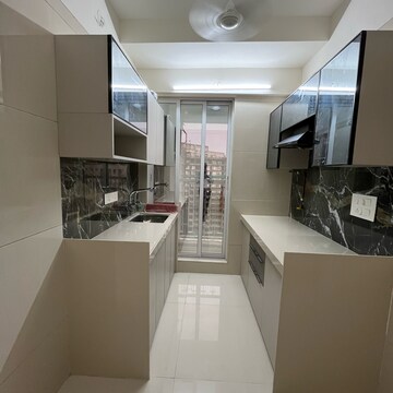 Kitchen in 2 BHK Apartment at Unique Ivana, Hatkesh Udhog Nagar – for Rent