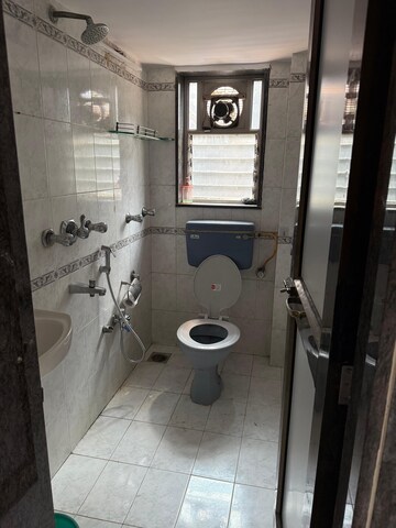 Bathroom in 2 BHK Apartment at Bamboo House, Santacruz West – for Rent