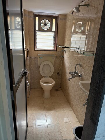 Bathroom in 2 BHK Apartment at Bamboo House, Santacruz West – for Rent