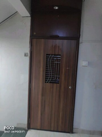 Building Lobby in 2 BHK Apartment at Oshiwara Mhada, Andheri West – for Rent