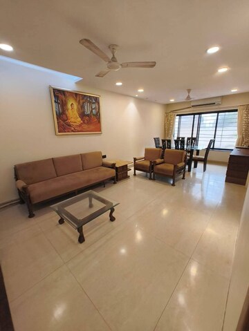 Living Room in 1 BHK Apartment at Suraj CHS Juhu, Juhu – for Rent
