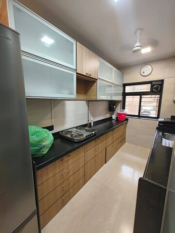 Kitchen in 1 BHK Apartment at Suraj CHS Juhu, Juhu – for Rent