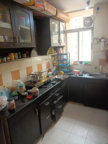 Kitchen in 3 BHK Apartment at Ashiana Palm Court, Raj Nagar Extension – for Rent