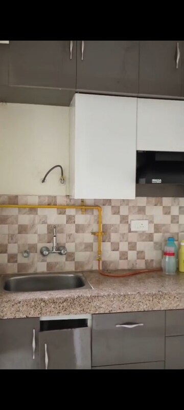 Kitchen in 2 BHK Apartment at JKG Palm Resort, Raj Nagar Extension – for Rent