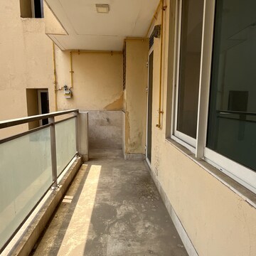 Balcony in 3.5 BHK Apartment at Ambience Tivertone, Sector 50 – for Rent