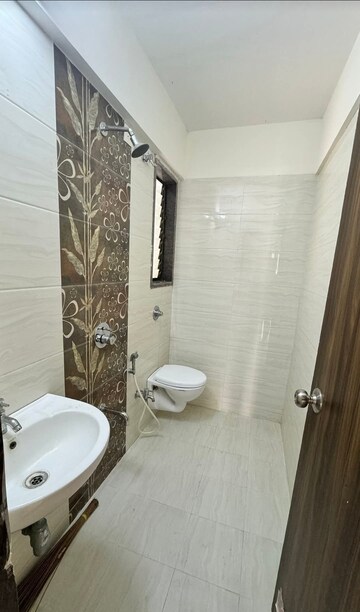 Bathroom in 2 BHK Apartment at Abrol Avirahi Heights, Malad West – for Rent