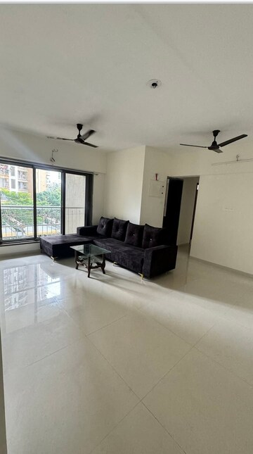 Living Room in 2 BHK Apartment at Abrol Avirahi Heights, Malad West – for Rent