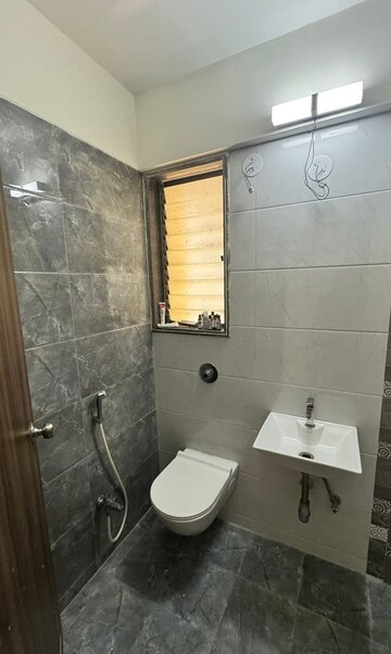 Bathroom in 2 BHK Apartment at Abrol Avirahi Heights, Malad West – for Rent