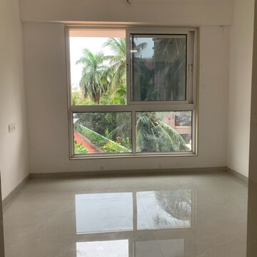Room in 2.5 BHK Apartment at Shraddha Elite, Poisar – for Sale