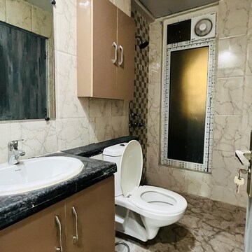 Bathroom in 3 BHK Apartment at Mahagun Mirabella, Sector 79 – for Rent