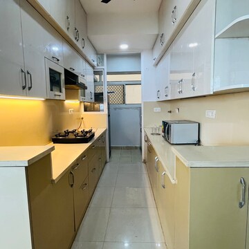 Kitchen in 3 BHK Apartment at Mahagun Mirabella, Sector 79 – for Rent
