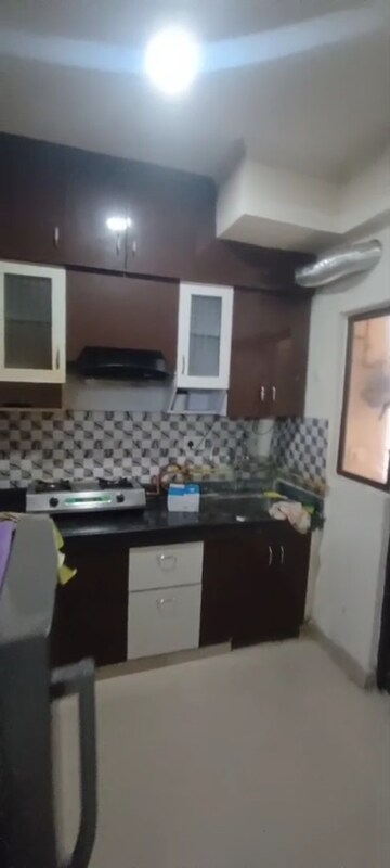 Kitchen in 2 BHK Apartment at SG Grand, Raj Nagar Extension – for Rent