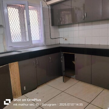 Kitchen in 4 BHK Apartment at Jubilee Apartments, Sector 15 – for Rent