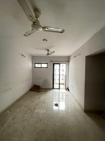 Living Room in 1.5 BHK Apartment at Lodha Palava City Lakeshore Greens, Dombivli East – for Sale