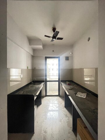 Kitchen in 1.5 BHK Apartment at Lodha Palava City Lakeshore Greens, Dombivli East – for Sale