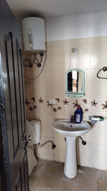 Bathroom in 3.5 BHK Apartment at Prateek Wisteria, Sector 77 – for Sale