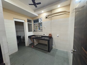 Kitchen in 3 BHK Apartment at Emami City, Golpark – for Rent