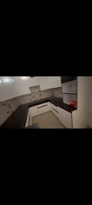 Kitchen in 2.5 BHK Apartment at Charms Castle, Raj Nagar Extension – for Sale