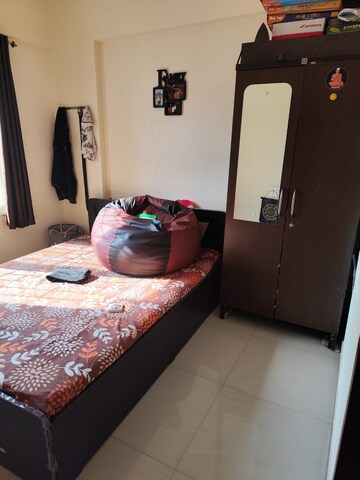 Bedroom in 2 BHK Apartment at Yogesh Gandharva Excellence, Moshi – for Rent
