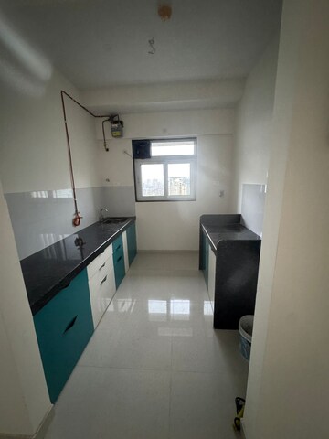 Kitchen in 2 BHK Apartment at Ashar Axis, Majiwada – for Rent