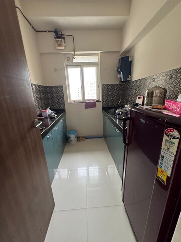 Kitchen in 1 BHK Apartment at Lodha Amara, Kolshet Road – for Sale