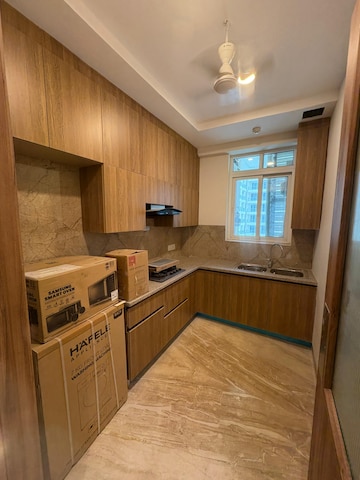 Kitchen in 4 BHK Apartment at DLF The Camellias, Sector 42 – for Rent