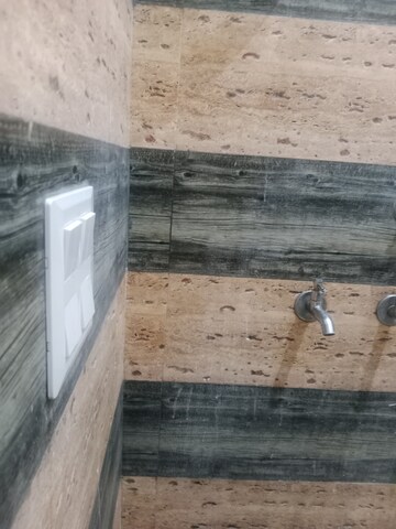 Bathroom in 1.5 BHK Builder Floor at Ansals Sushant City – for Rent