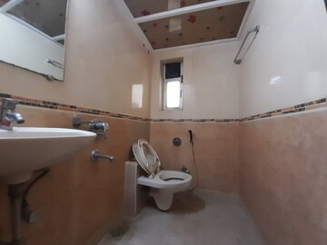 Bathroom in 4 BHK Apartment at Gokuldham Complex, Goregaon East – for Rent