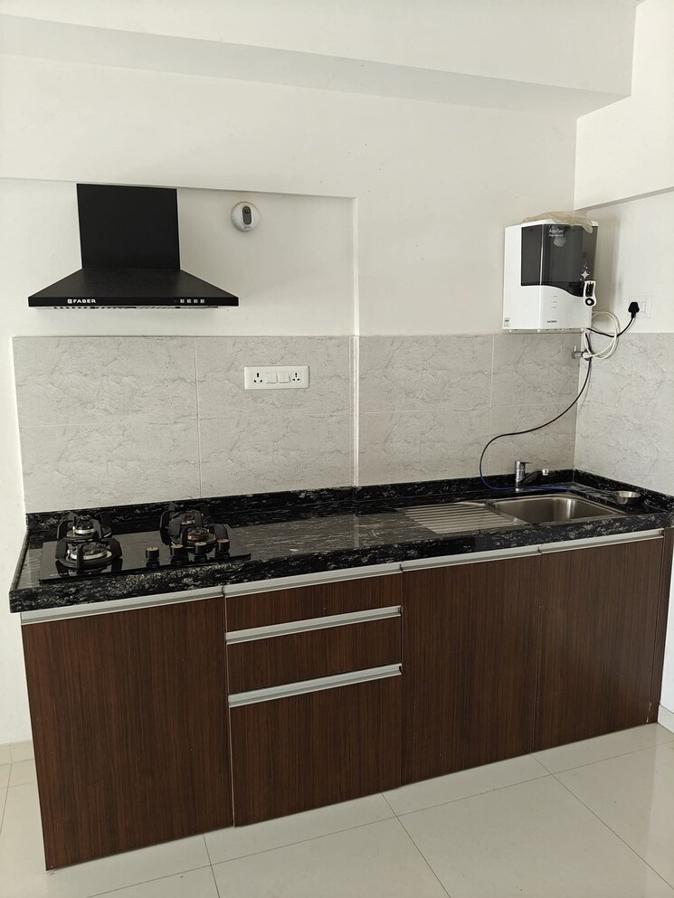 Kitchen, gera-world-of-joy 1 RK 250 Sq.Ft. Apartment In Kharadi Pune 8930721