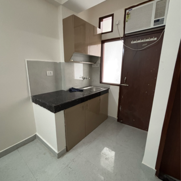 Kitchen in 1 RK Builder Floor at AIHP Palms, Udyog Vihar – for Rent