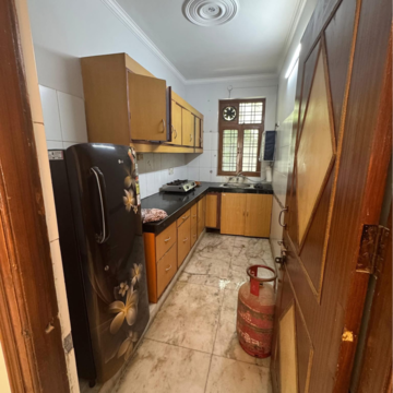 Kitchen in 2 BHK Builder Floor at Ansal Plaza Sector-23, Carterpuri Village – for Rent