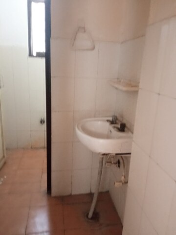 Bathroom in 1.5 BHK Apartment at Gokuldham LIG Apartments, Sector 135 – for Sale