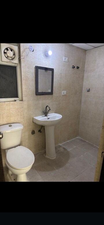 Bathroom in 3 BHK Apartment at Antriksh Golf View, Sector 78 – for Rent