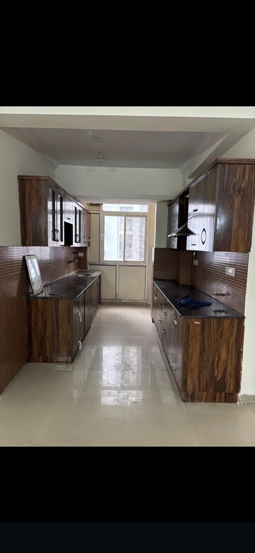 Kitchen in 3 BHK Apartment at Antriksh Golf View, Sector 78 – for Rent
