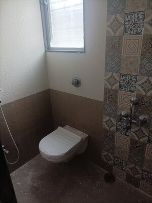 Bathroom in 2 BHK Apartment at Vighnaharta Sai Saroj, Ravet – for Rent