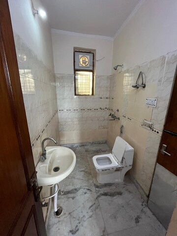 Bathroom in 3 BHK Builder Floor at Green Fields Colony – for Rent
